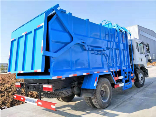 東風(fēng)多利卡D9側(cè)裝壓縮式垃圾車(chē)圖片